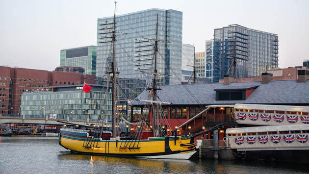 Boston harbor with historical ship