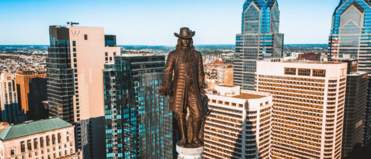 Statue at the top of a building