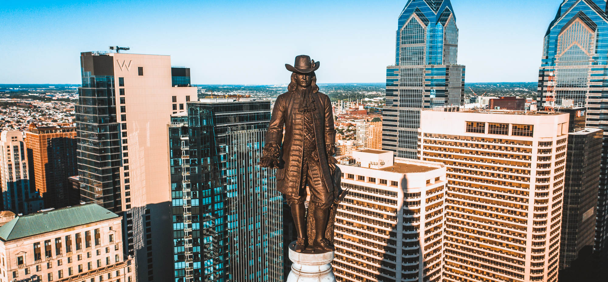 Statue at the top of a building