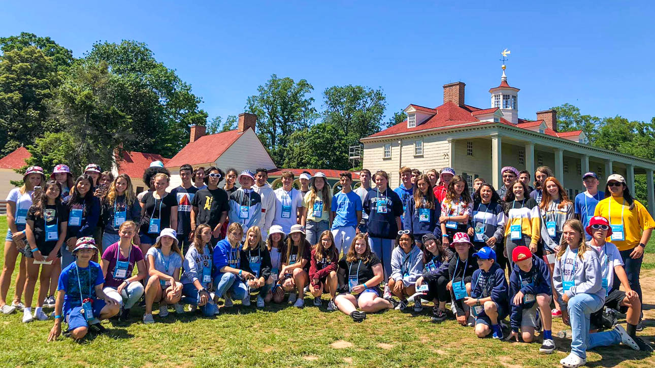 Group of students taking a group photo at Mount Vernon