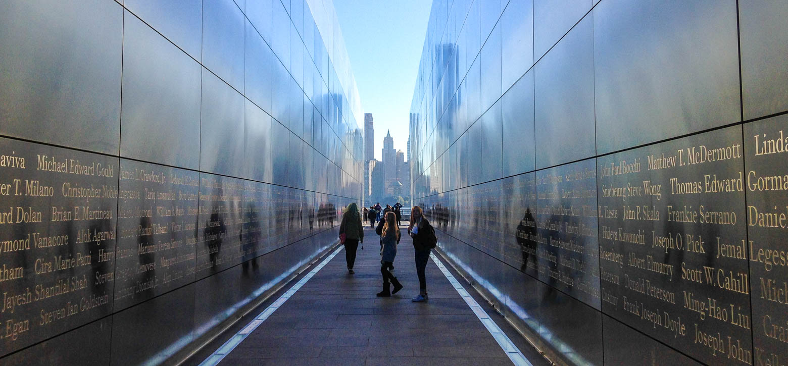 Students looking at a memorial