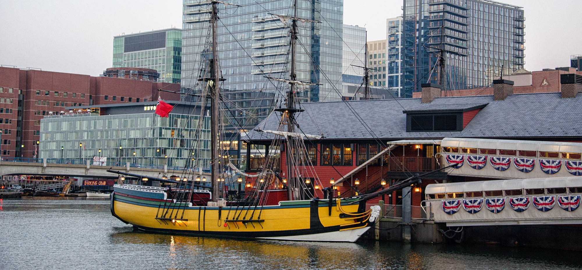 Boston harbor with historical ship