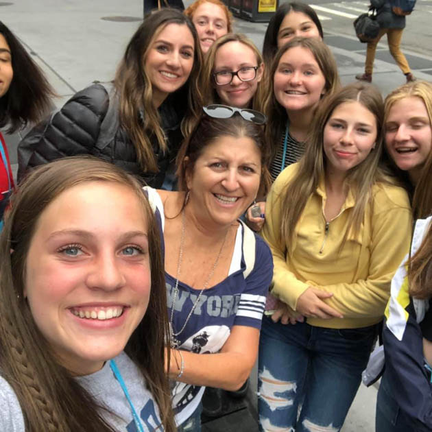 Group of travelers taking a selfie