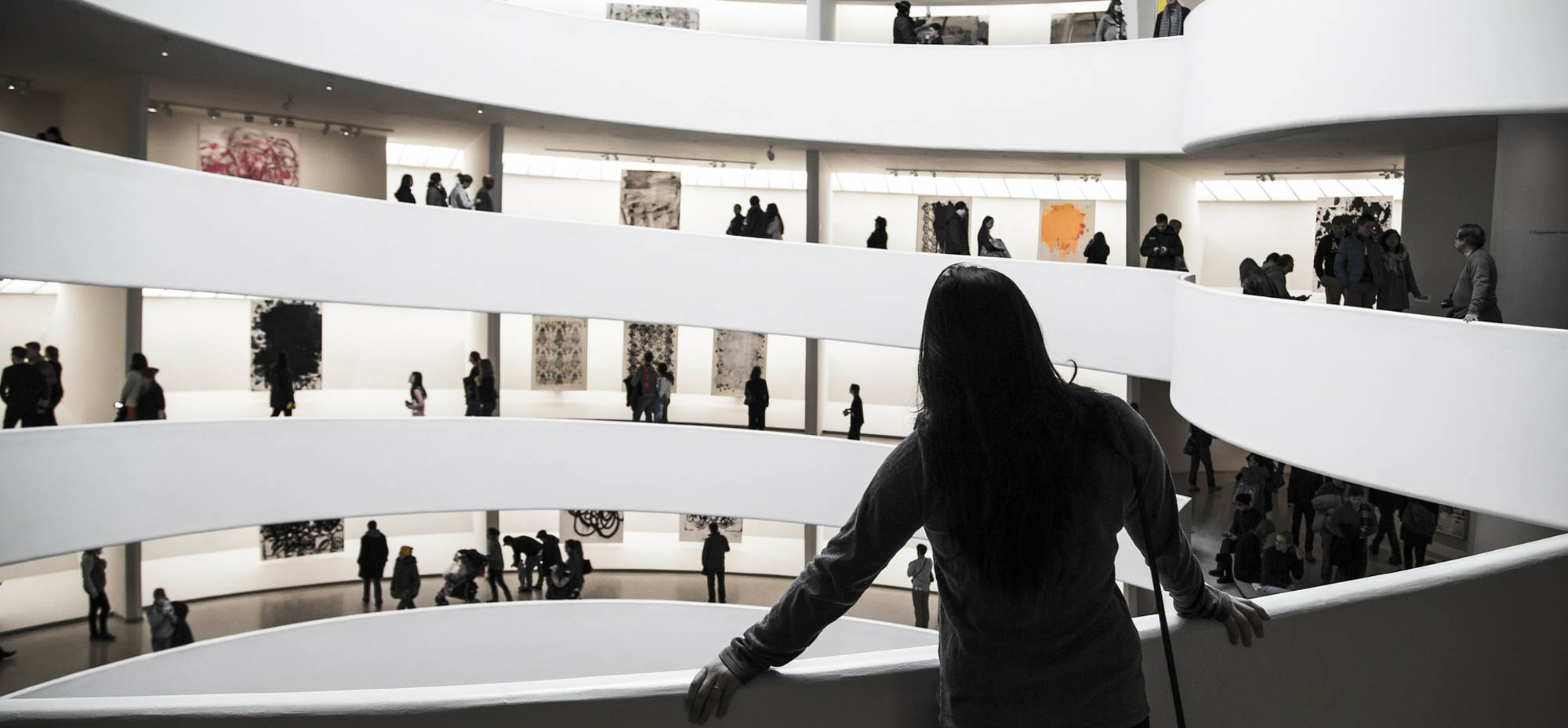 Person looking at art in the Guggenheim Museum