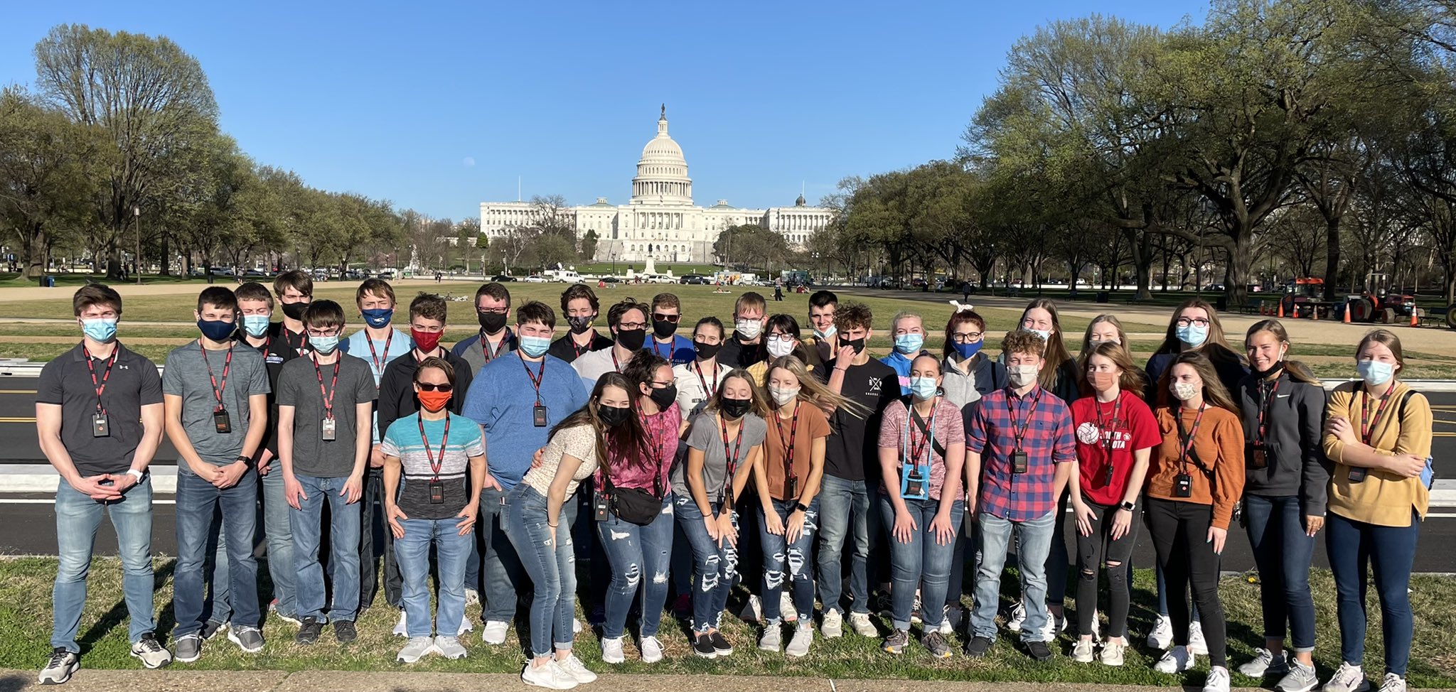 students on an educational tour in front of the US Capitol