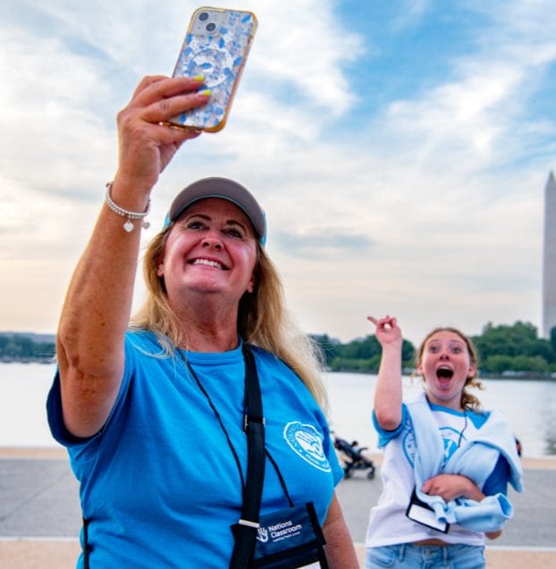 Tour guide and a student taking a selfie