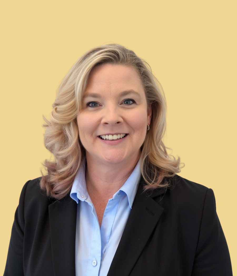 Portrait of Stacey L., Chief Accounting Officer on a yellow background