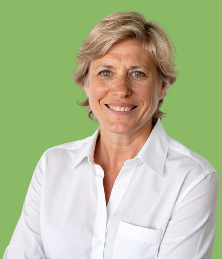 Portrait of Madeline W, Tour Coordinator, on a green background